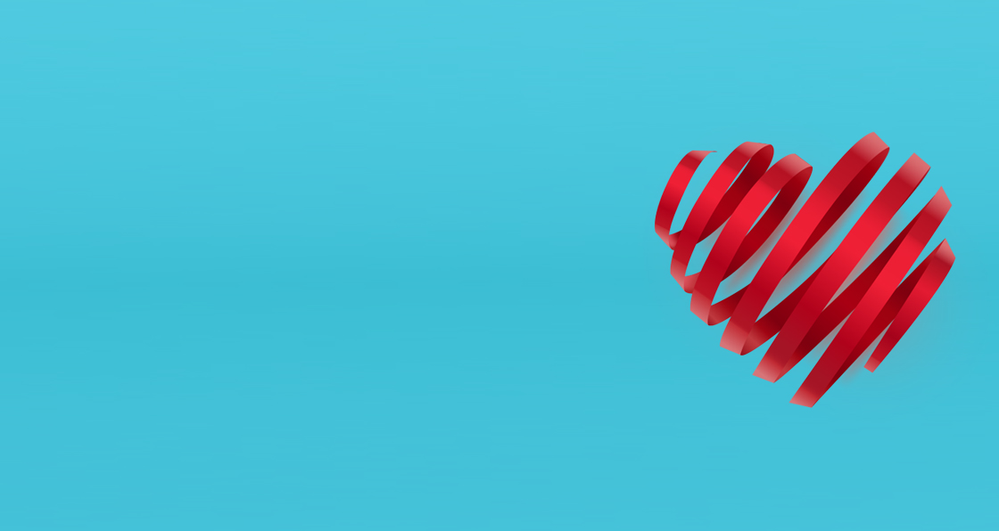 Red alarm clock on ablue background